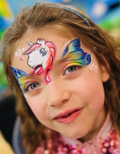 Girl with a unicorn face paint in Telford
